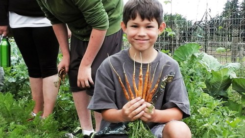 kid with carrots